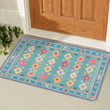 Teal My Life Entrance Door Mat with Diamond Pattern in front of wooden door