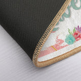 Personalized floral floor mat with "Sweet" text; non-slip backing, washable rug.