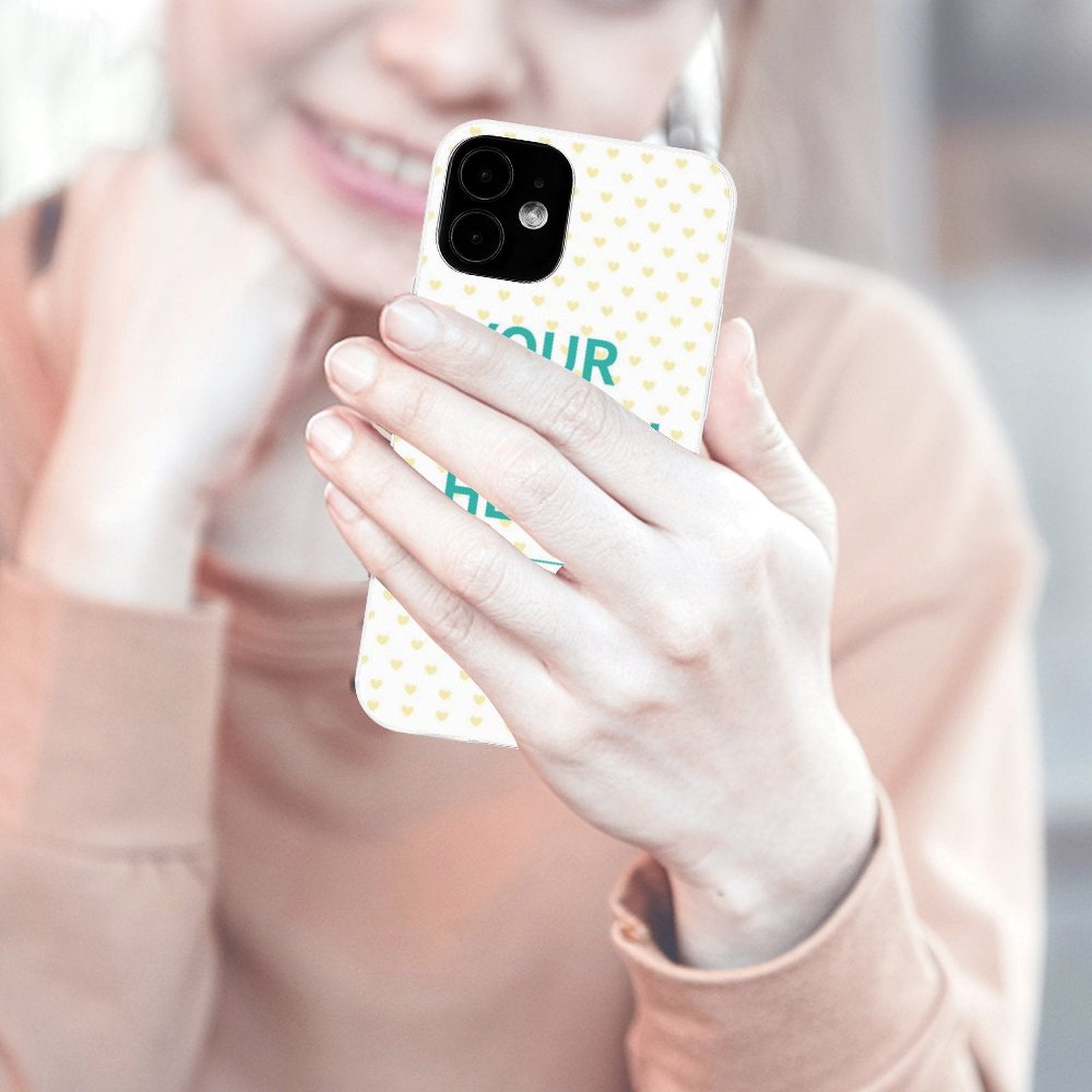 Custom iPhone 12 case with heart pattern and personalized design. Transparent TPU material.