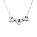 Personalized silver heart necklace with numbers 1, 2, and 3. Perfect jewelry gift.