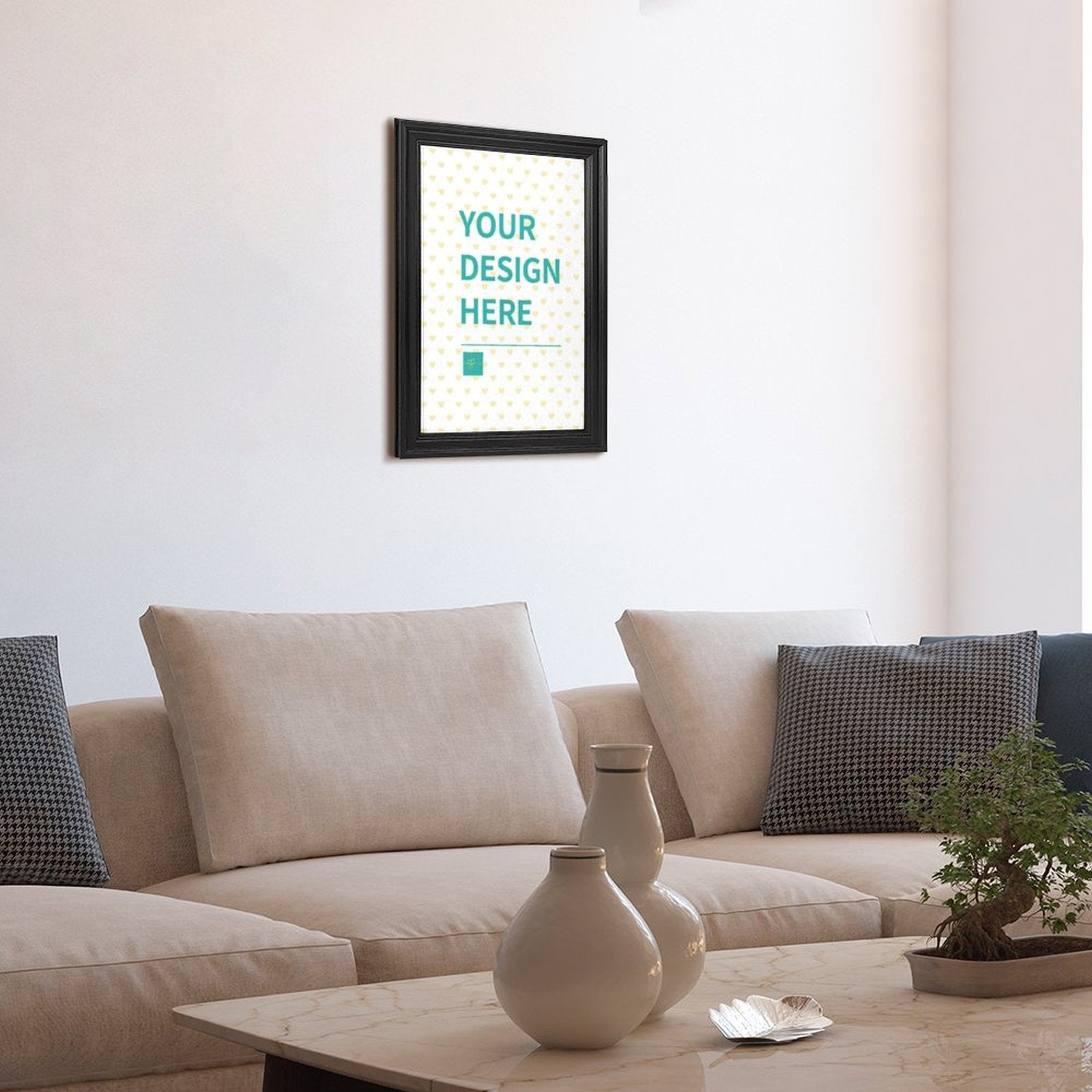 Custom canvas print with 'YOUR DESIGN HERE' text in a black frame, personalized wall art for home decor