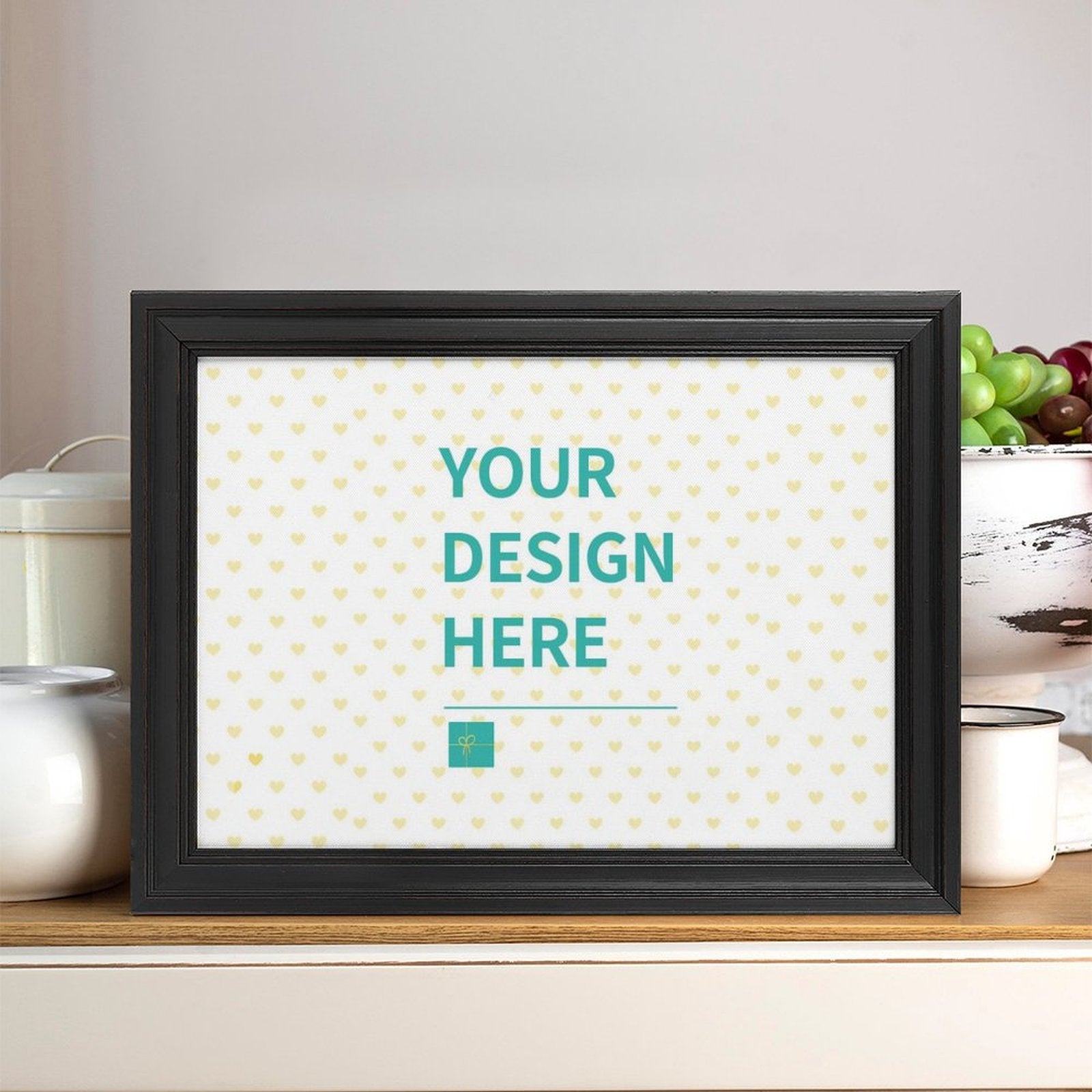 Custom canvas print with black frame, displaying 'YOUR DESIGN HERE', personalized wall art, ideal gift.
