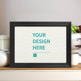 Custom canvas print with black frame, displaying 'YOUR DESIGN HERE', personalized wall art, ideal gift.