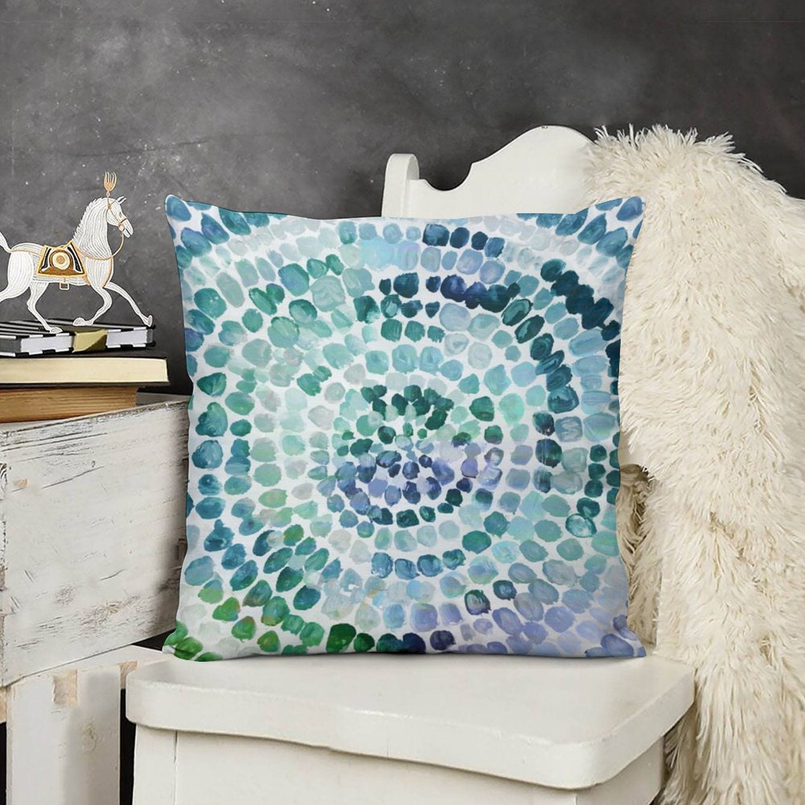 Abstract plush throw pillow cover with spiral dot design in blue and green, for sofa or couch.