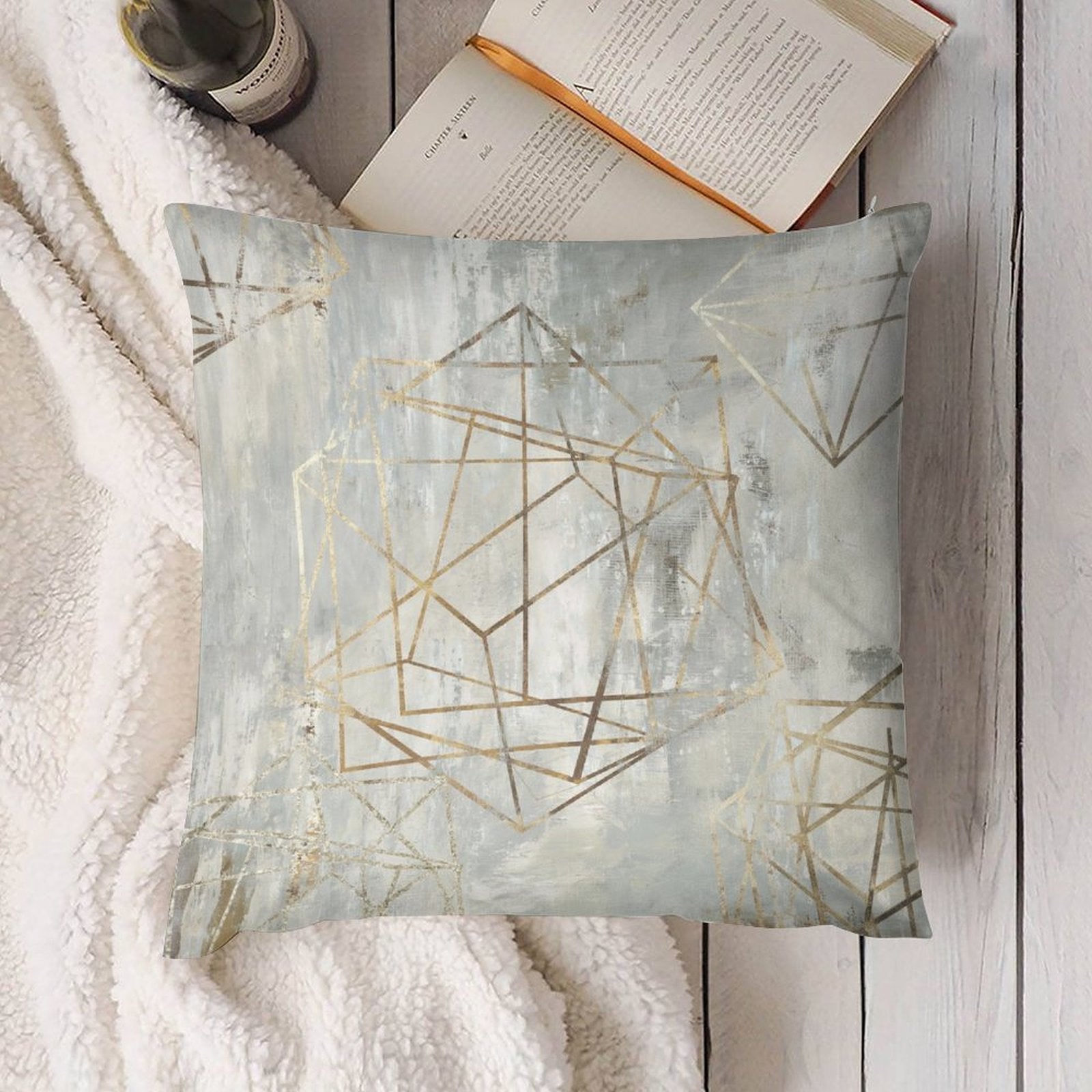 Geometric gold plush pillow cover, soft and fluffy, living room decor, abstract design, with book in the background