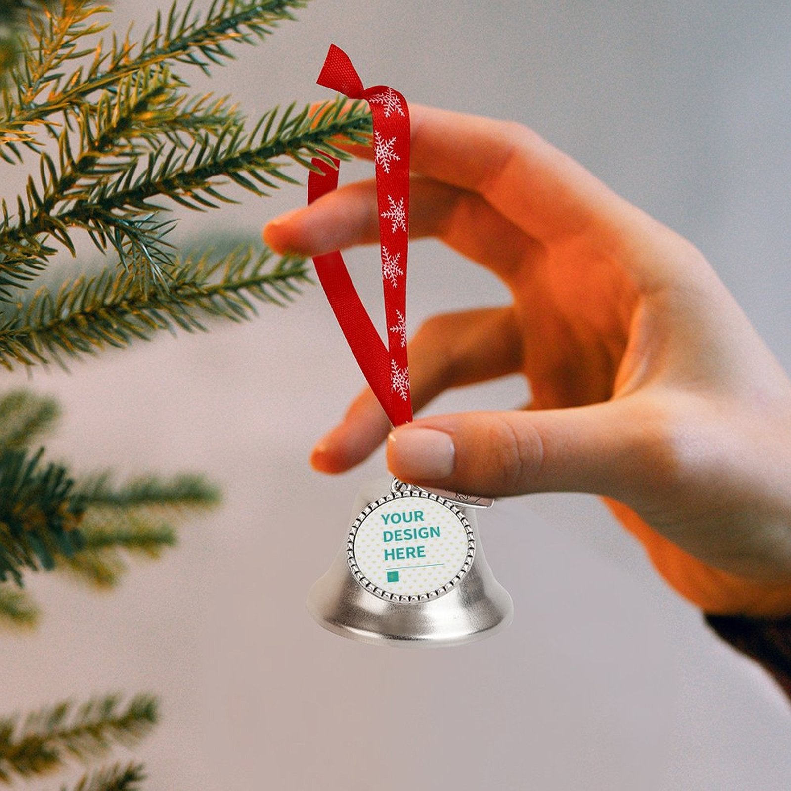 Custom Christmas jingle bell with 'YOUR DESIGN HERE', red ribbon and snowflake design for Christmas tree decoration