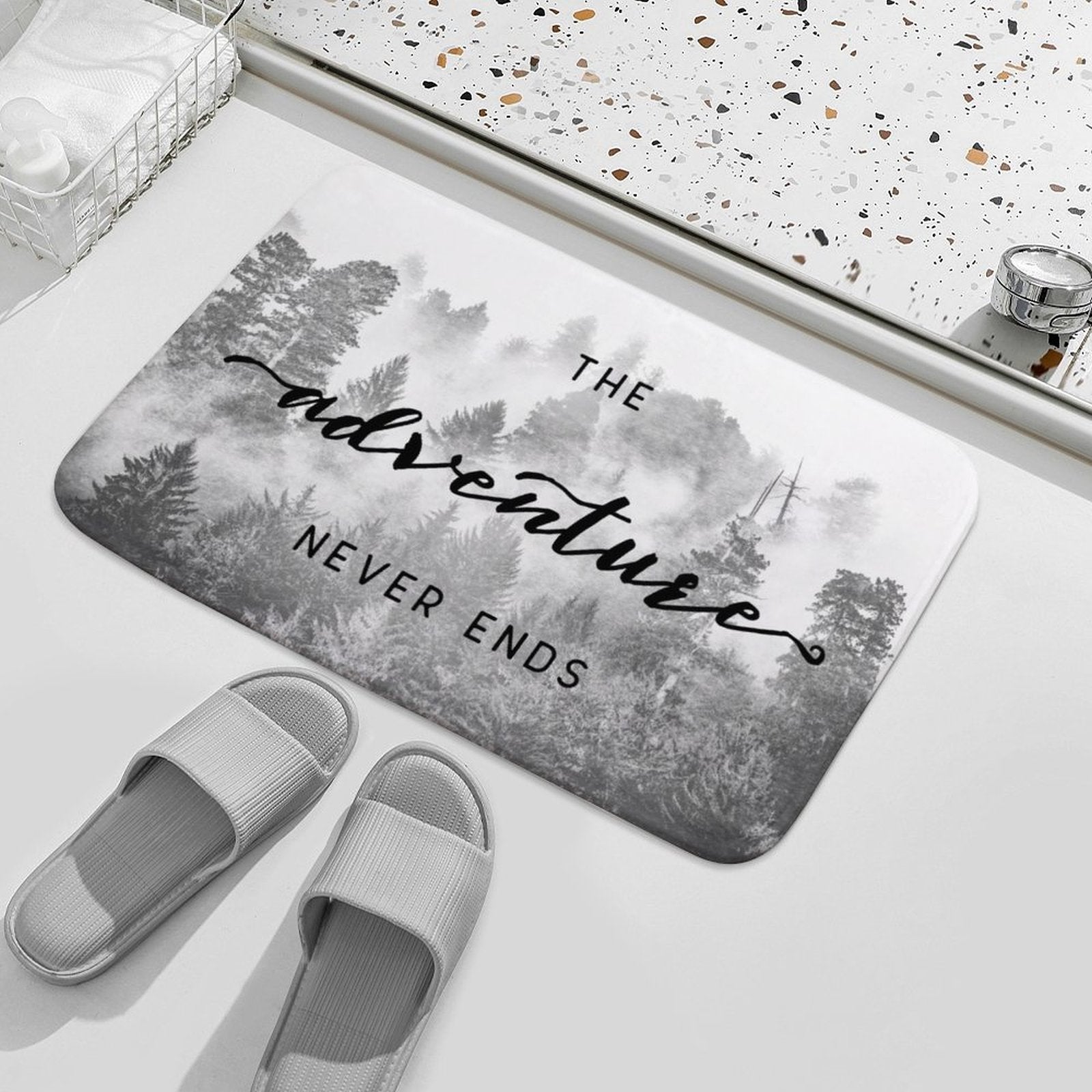 Coral velvet bath rug with misty forest design and "The Adventure Never Ends" quote for bathroom; non-slip.