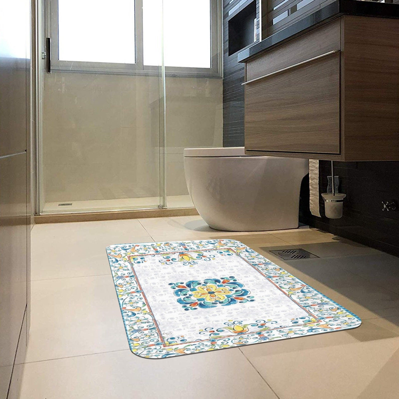 Mediterranean doormat with floral design in bathroom. Indoor or outdoor use, durable and decorative.