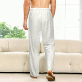 White heart-patterned pajama pants for men from MyArtsyGift, perfect for comfortable sleep and casual wear.