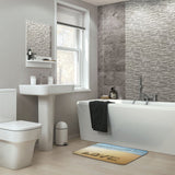 Coral velvet bath rug with beach 'LOVE' scene in a modern bathroom setting, non-slip and quick-drying.