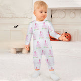 Newborn baby in white octopus print romper. Soft cotton jumpsuit from MyArtsyGift.