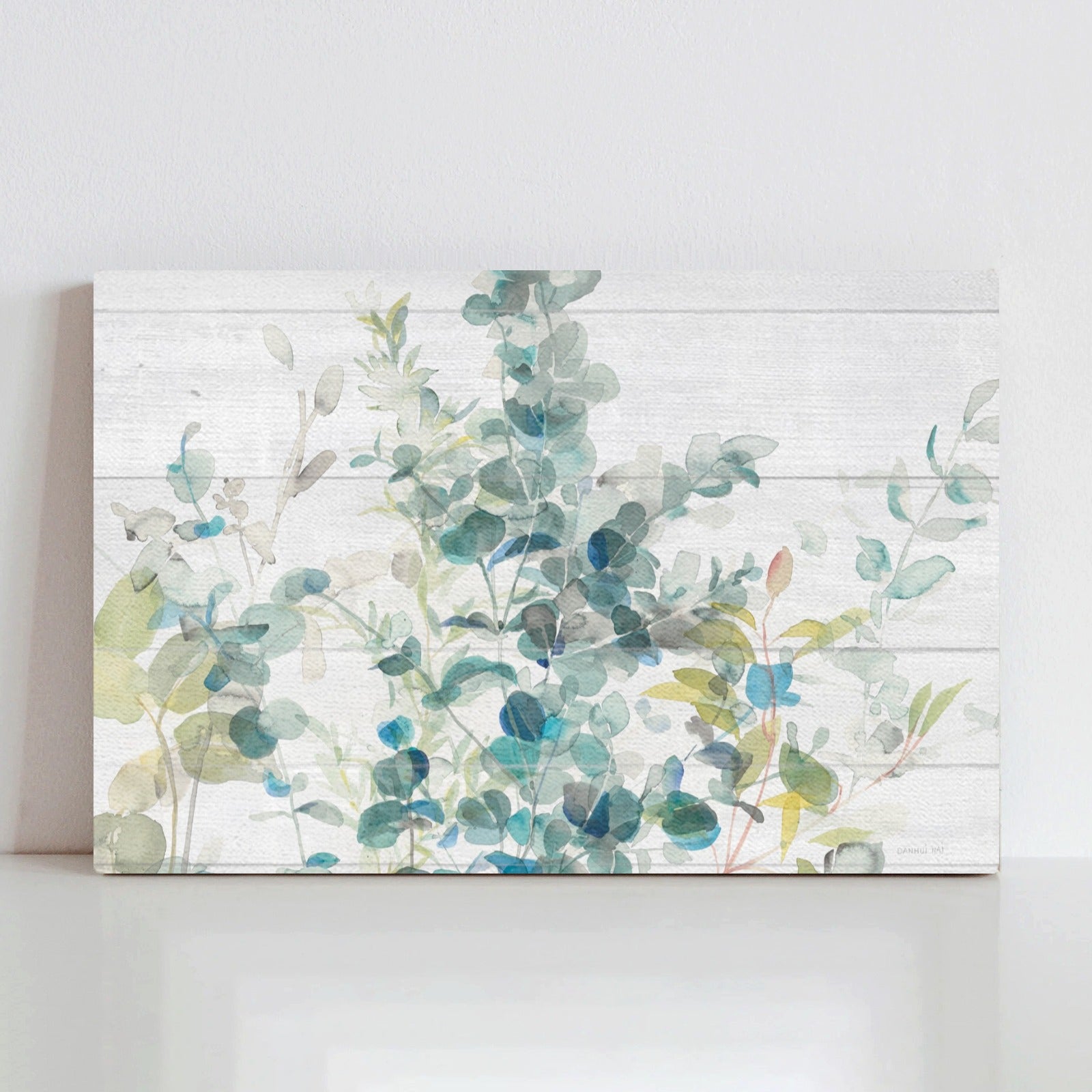 Eucalyptus I on Shiplap Canvas Print. Watercolor art with green and blue leaves.