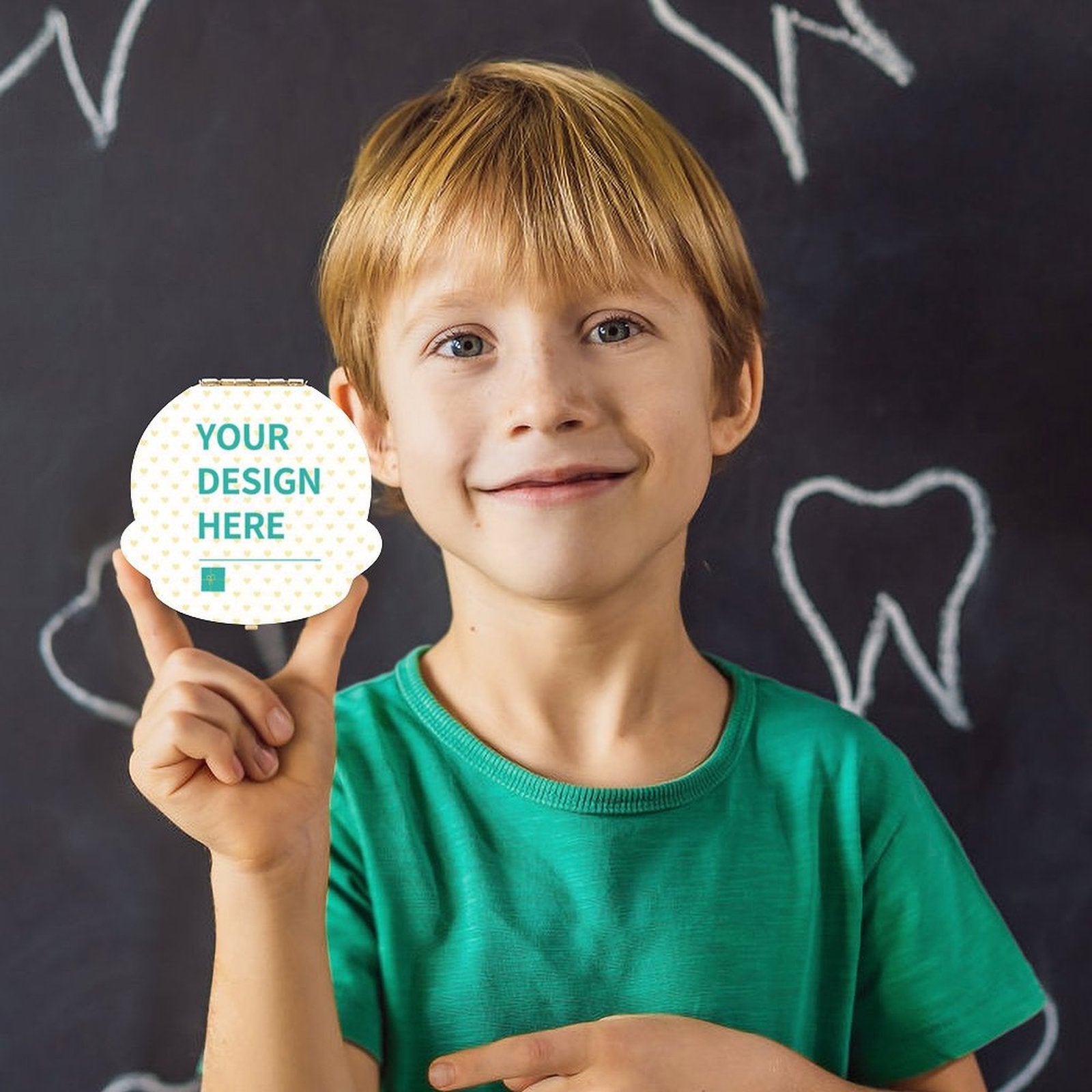 Smiling boy holding a personalized tooth box with 'YOUR DESIGN HERE', a keepsake gift for baby teeth