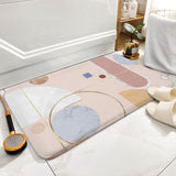 Coral velvet bath rug with abstract geometric design. Non-slip bathroom floor carpet, pink and beige color.