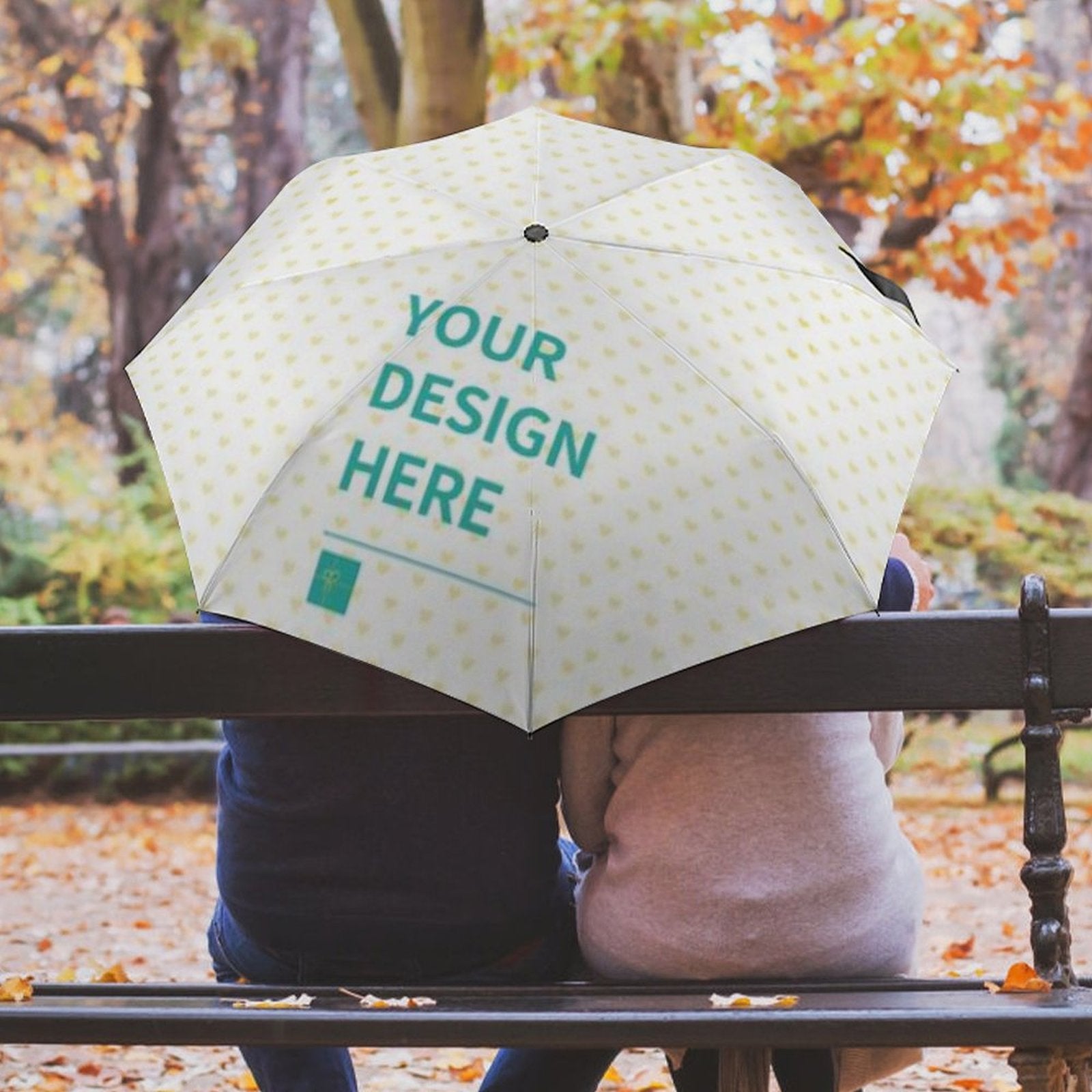 Customizable umbrella with 'Your Design Here' text, windproof and UV resistant, the perfect personalized gift.