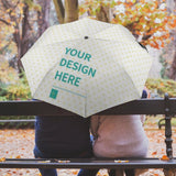 Customizable umbrella with 'Your Design Here' text, windproof and UV resistant, the perfect personalized gift.