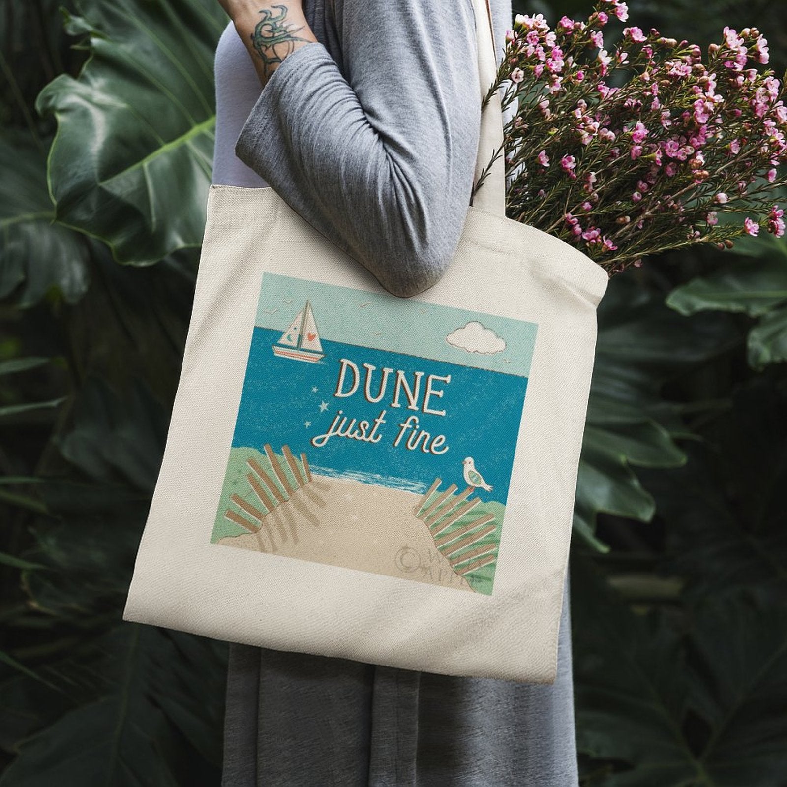 Canvas tote bag with beach graphic and "DUNE just fine" text; perfect shopping bag.
