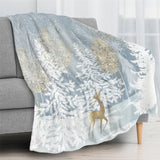 Blue winter forest flannel blanket featuring deer and snowy trees, perfect for sofa, couch or bed