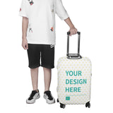 Custom luggage cover with 'YOUR DESIGN HERE' text, white with yellow hearts pattern, suitcase protector by MyArtsyGift