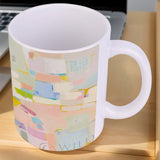 Custom white ceramic mug with colorful abstract art, perfect gift for home or office use.