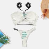 Customizable white bikini swimsuit with 'YOUR DESIGN HERE' text, perfect for beach, pool, or parties.
