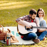 Picnic with guitar on a waterproof, foldable picnic mat; perfect for outdoor use, family picnic.