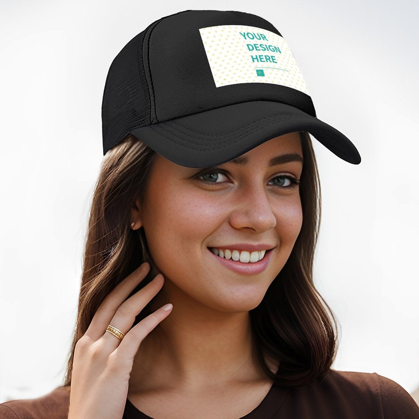 Custom black mesh baseball cap with 'YOUR DESIGN HERE' on woman; personalized gifts