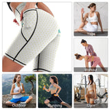White heart patterned high waisted yoga capris with pockets for workouts, running, yoga, and gym activities.