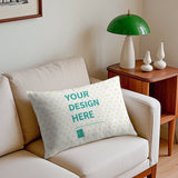 Customizable throw pillow case featuring 'YOUR DESIGN HERE' on sofa. Perfect for living room decor.
