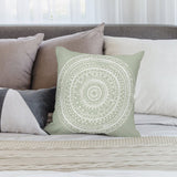 Light green plush pillow cover with white mandala design. Decorative, soft, and ideal for a sofa or living room.