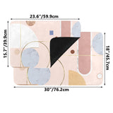 Pink abstract entrance doormat with geometric design and rubber backing, ideal for indoor/outdoor use, with dimensions.