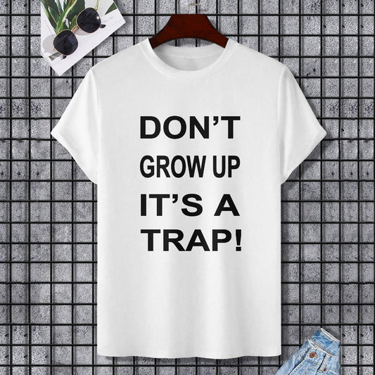 White Gildan unisex t-shirt with "DON'T GROW UP IT'S A TRAP!" print, perfect for casual wear.