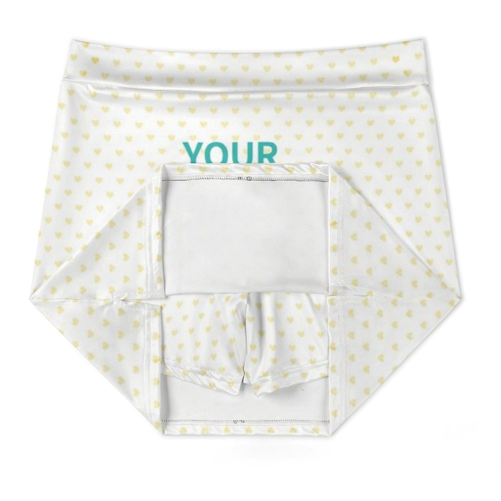 Customizable tennis skort for women. White fabric, heart print, and 'YOUR' text.