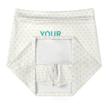 Customizable tennis skort for women. White fabric, heart print, and 'YOUR' text.