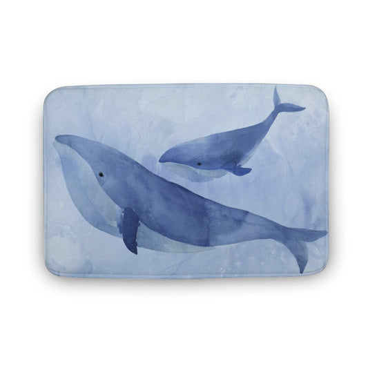 Coral velvet bathroom rug with watercolor whales design, non-slip and quick-drying.