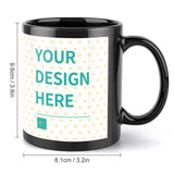 Personalized black ceramic mug with 'YOUR DESIGN HERE' design, a perfect gift.