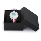 Custom photo watch with personalized design, nylon strap, and text 'YOUR DESIGN HERE', in a gift box.