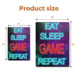 Metal wall art with neon-style 'Eat Sleep Game Repeat' design, perfect for home office decor, available in two sizes.