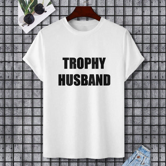White Gildan Unisex T-shirt with black 'TROPHY HUSBAND' text, perfect for a gift.