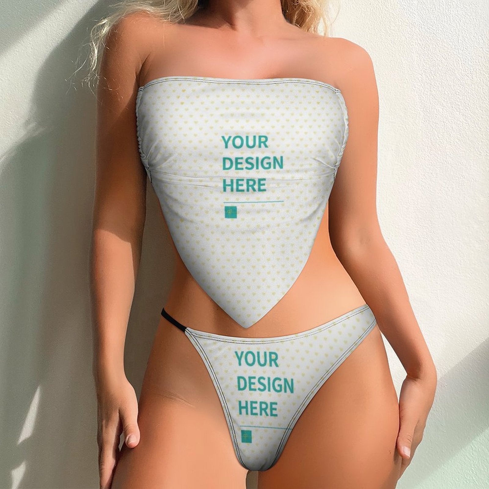 Custom Two Piece Swimsuit with "YOUR DESIGN HERE" print, made of shiny polyester and spandex, perfect for beach.