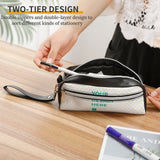 Two-tier personalized leather pen bag with double zippers, 'YOUR DESIGN HERE', for stationery, cosmetics, and office use.
