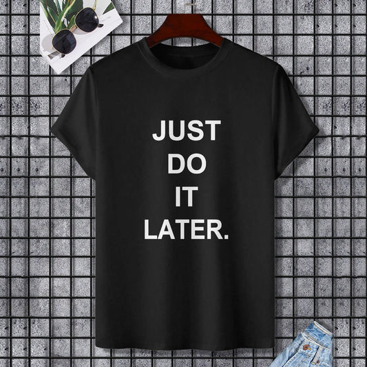 Black Gildan Unisex T-shirt with "JUST DO IT LATER." text, comfortable cotton tee.