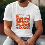 White Gildan T-shirt with "TikTok Refugee" orange stamp design; cotton fabric, unisex style.
