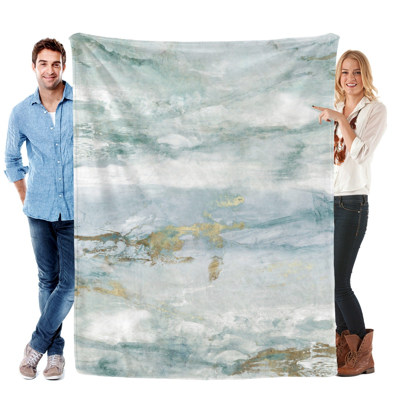 Green abstract flannel blanket for sofa with watercolor design held by models, made in USA