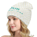 Custom white beanie featuring green 'OUR' design, polyester knit hat for men and women, perfect personalized gift.