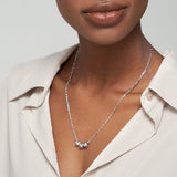 Silver custom name necklace with three engraved bead pendants, perfect personalized gift for men and women.