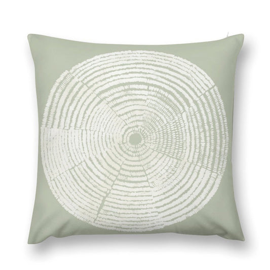 Sage green plush throw pillow with white tree ring design. Soft and fluffy decorative pillow cover for sofa or couch.