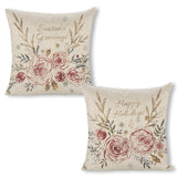 Christmas pillow covers with floral design and linen material. Features 'Season's Greetings' and 'Happy Holidays' text.