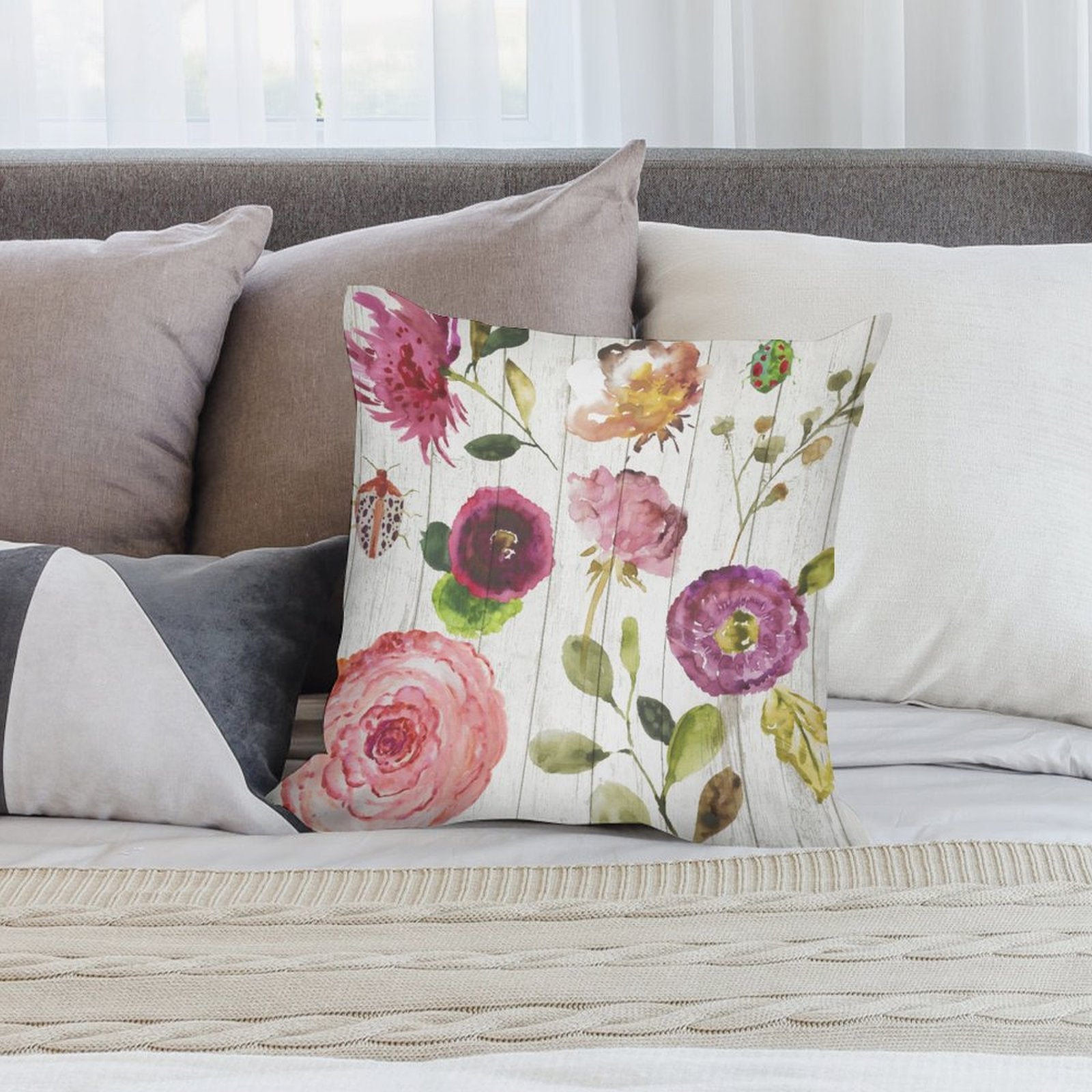 Watercolor floral plush throw pillow cover with pink and purple flowers for sofa and living room.