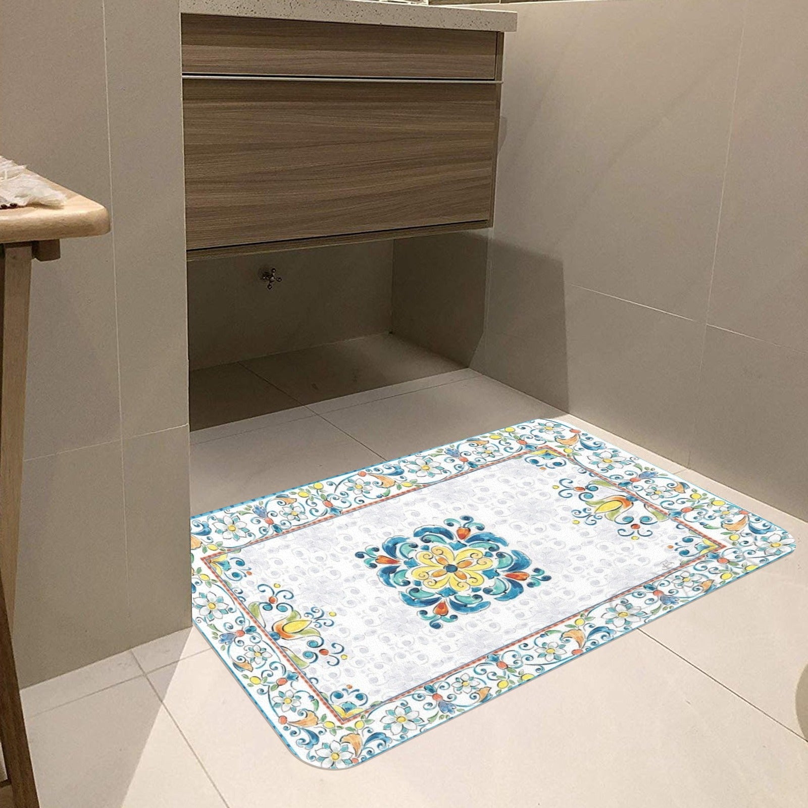Mediterranean doormat with colorful floral design in a bathroom setting. Decorative and functional, suitable for indoor use.